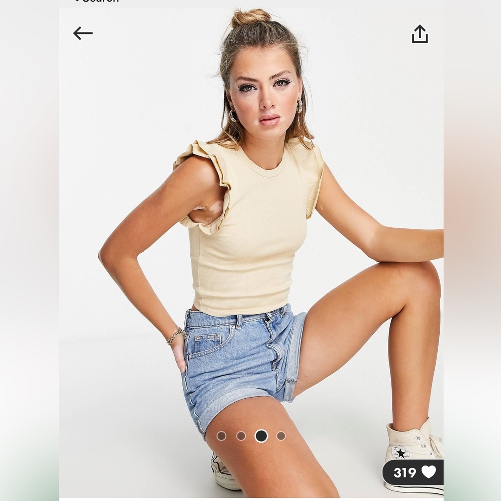 Sand colored knitted crop top with frill sleeves